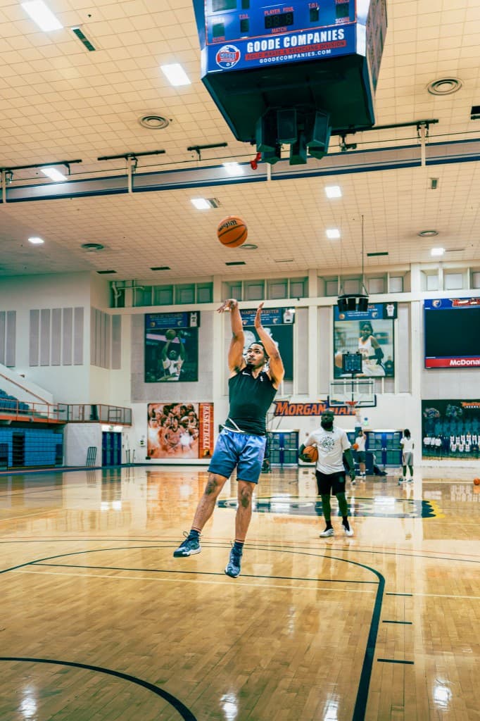 Player releasing a jump shot during Chipchasin Hoops training
